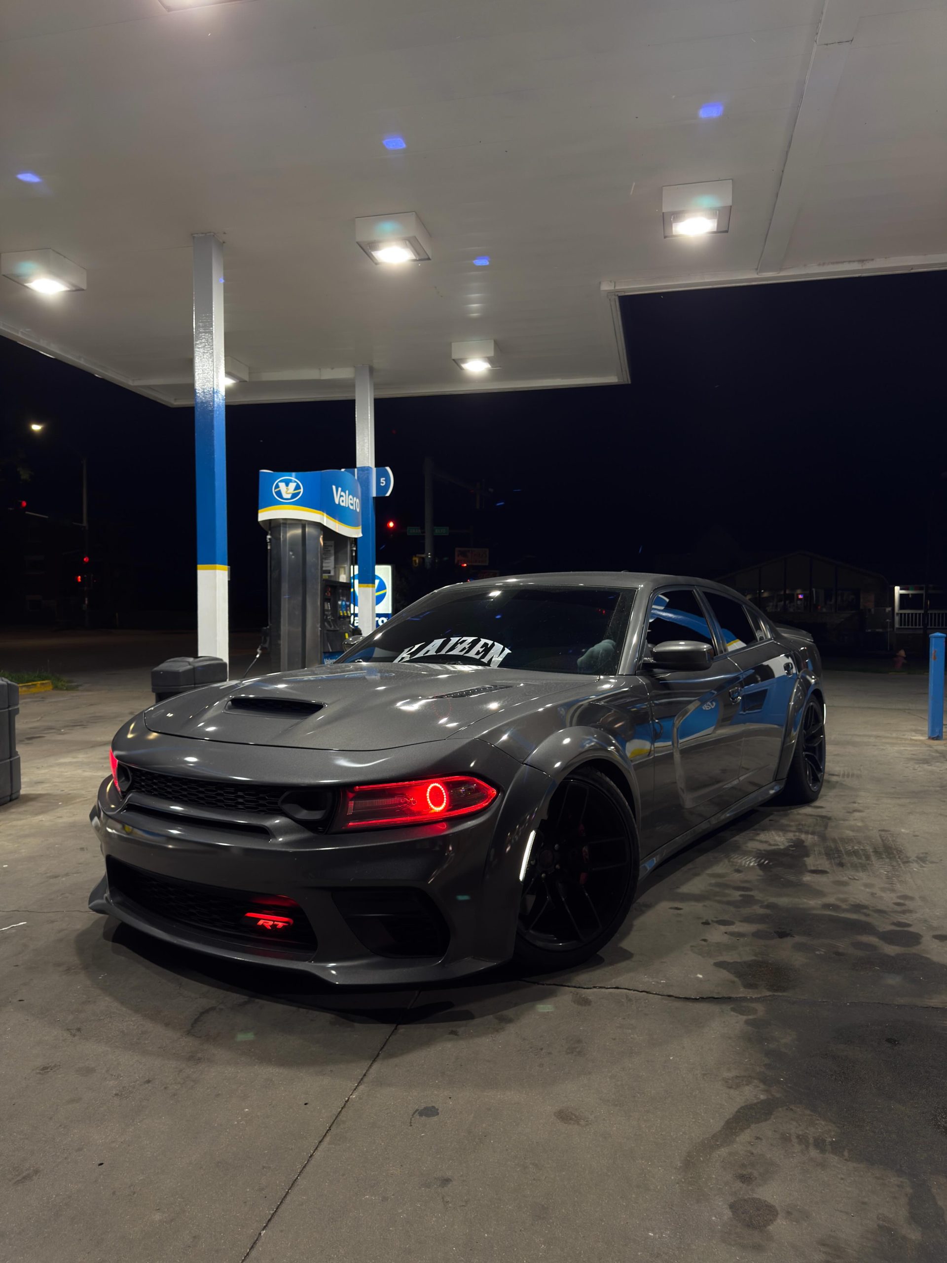 Black car parked outdoors front angle view