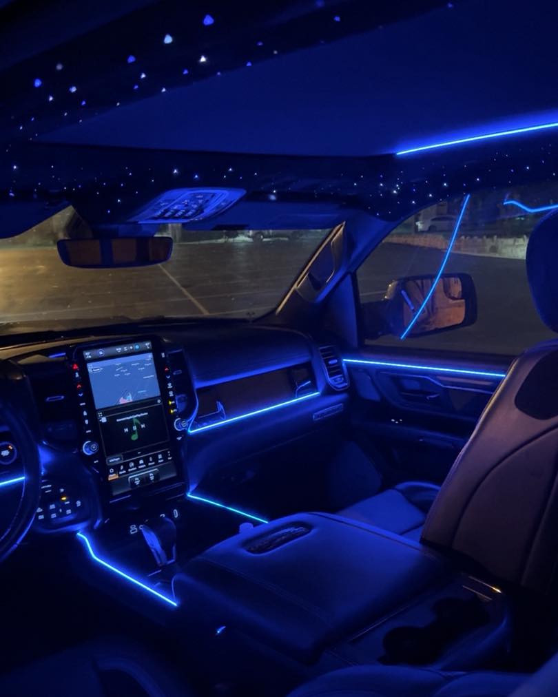 Blue ambient interior lighting in car at night