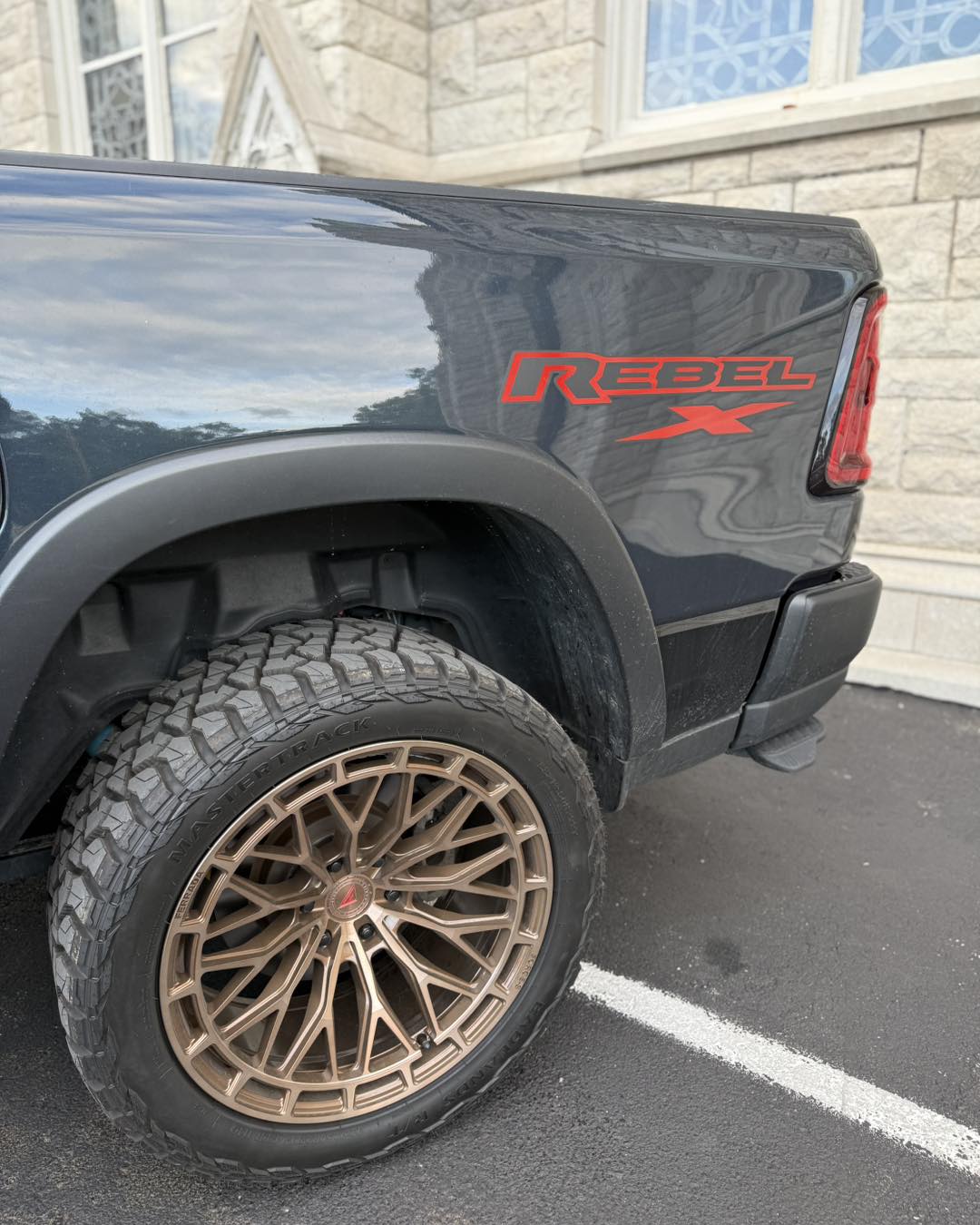 Muddy and dirty car wheel well and suspension